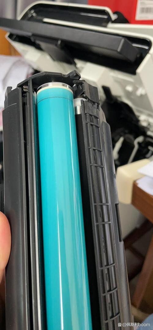 打印机换完硒鼓打印一条条黑印